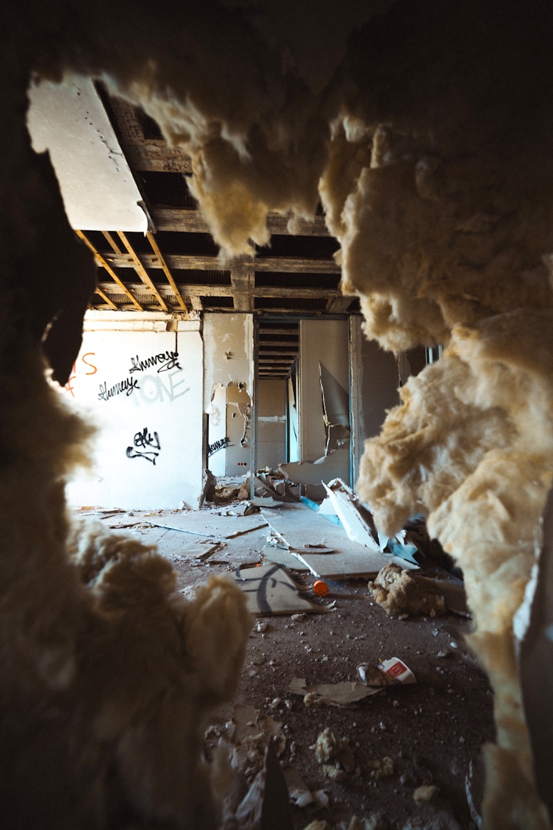 Inside an abandoned building, in a state of disrepair.